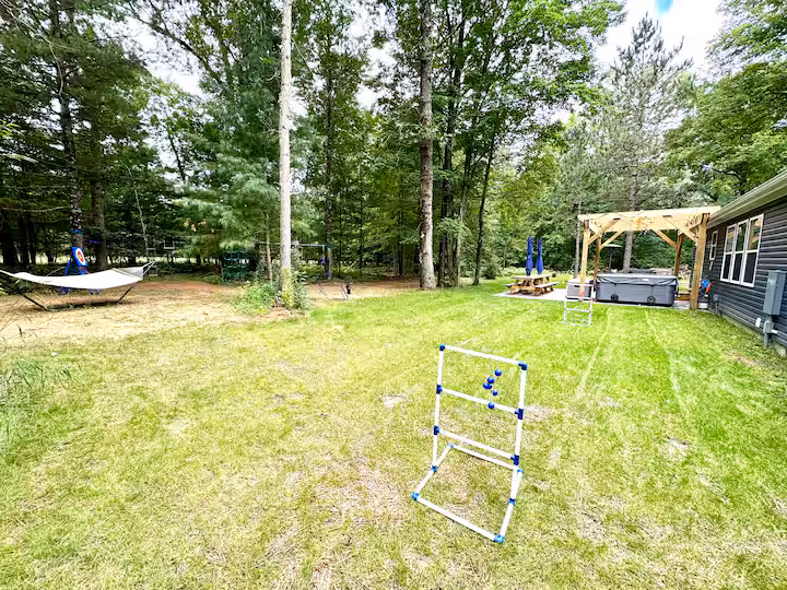 Fire pit and outdoor gathering space at Pine River Ranch